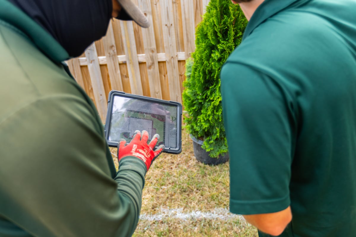 landscape crew reviewing plans