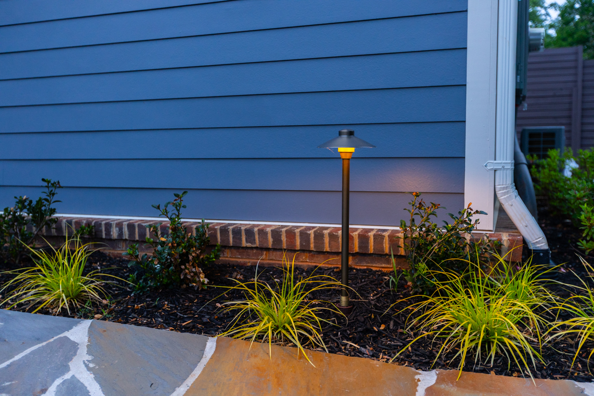 landscape path light natural stone mulch planting bed japanese forest grass