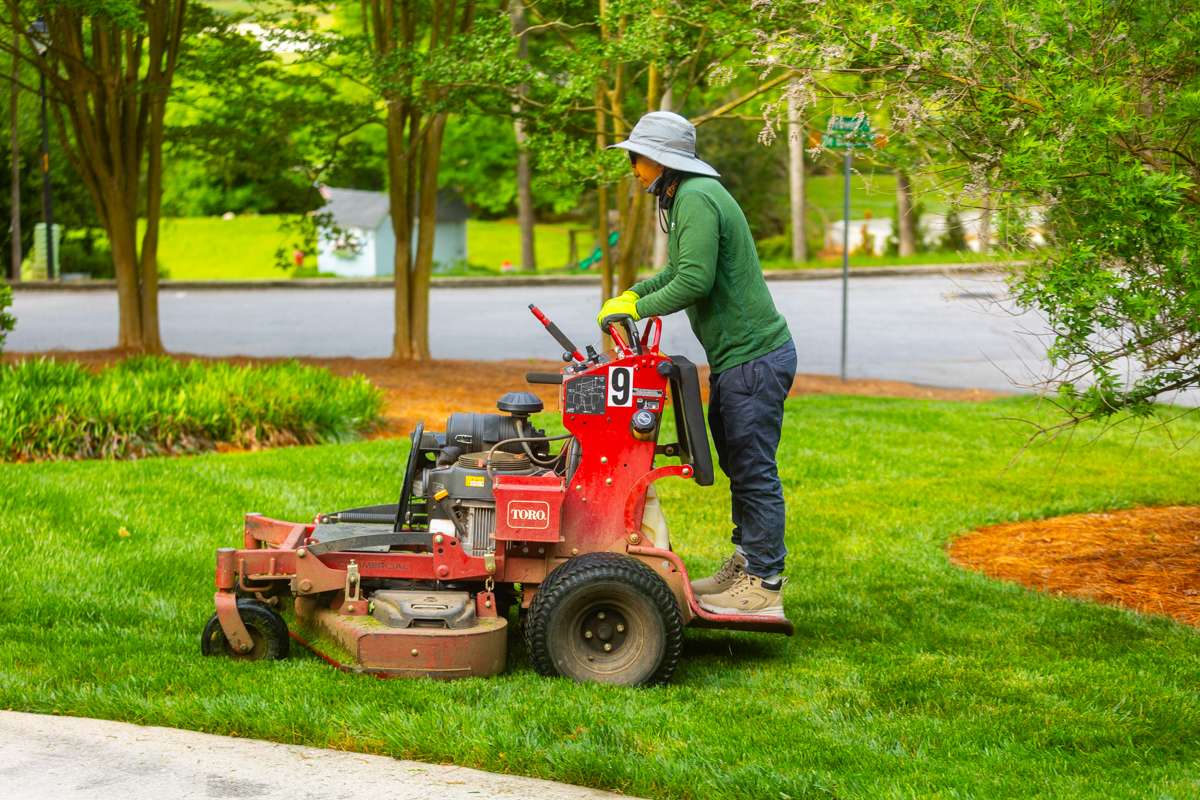 maintenance crew lawn mowing turf grass 4