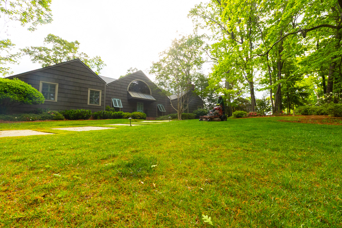 maintenance crew mowing lawn grass 2