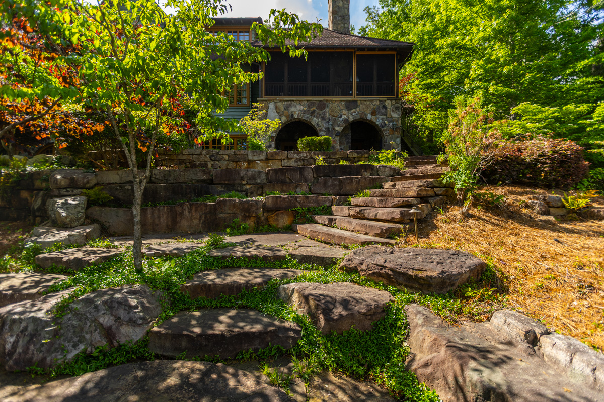 nice stone steps boulder slab steps home arch trees groundcover