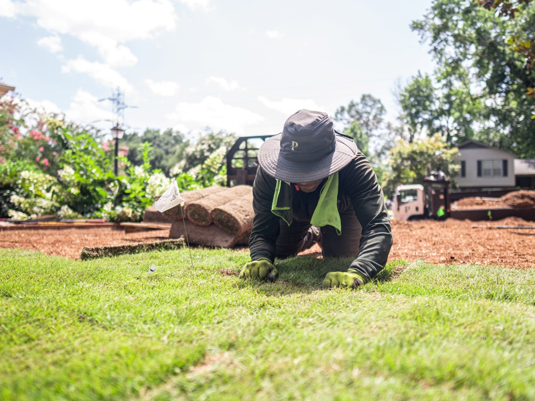 crew sod laying install grass roll