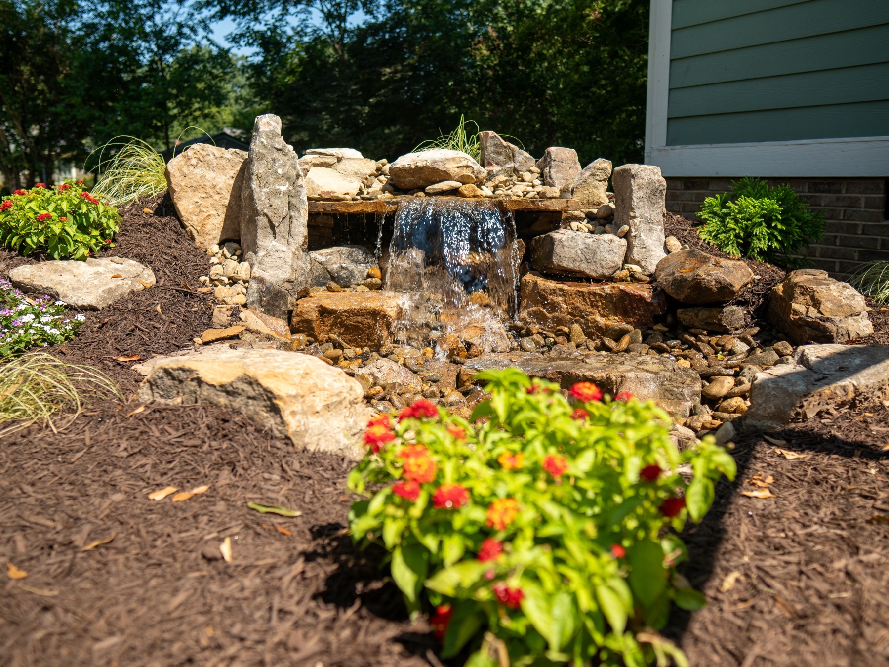 water feature gravel plant bed mulch
