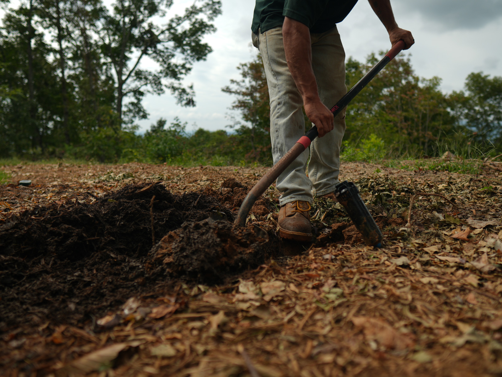 crew digging mulch bed sprinkler head 2