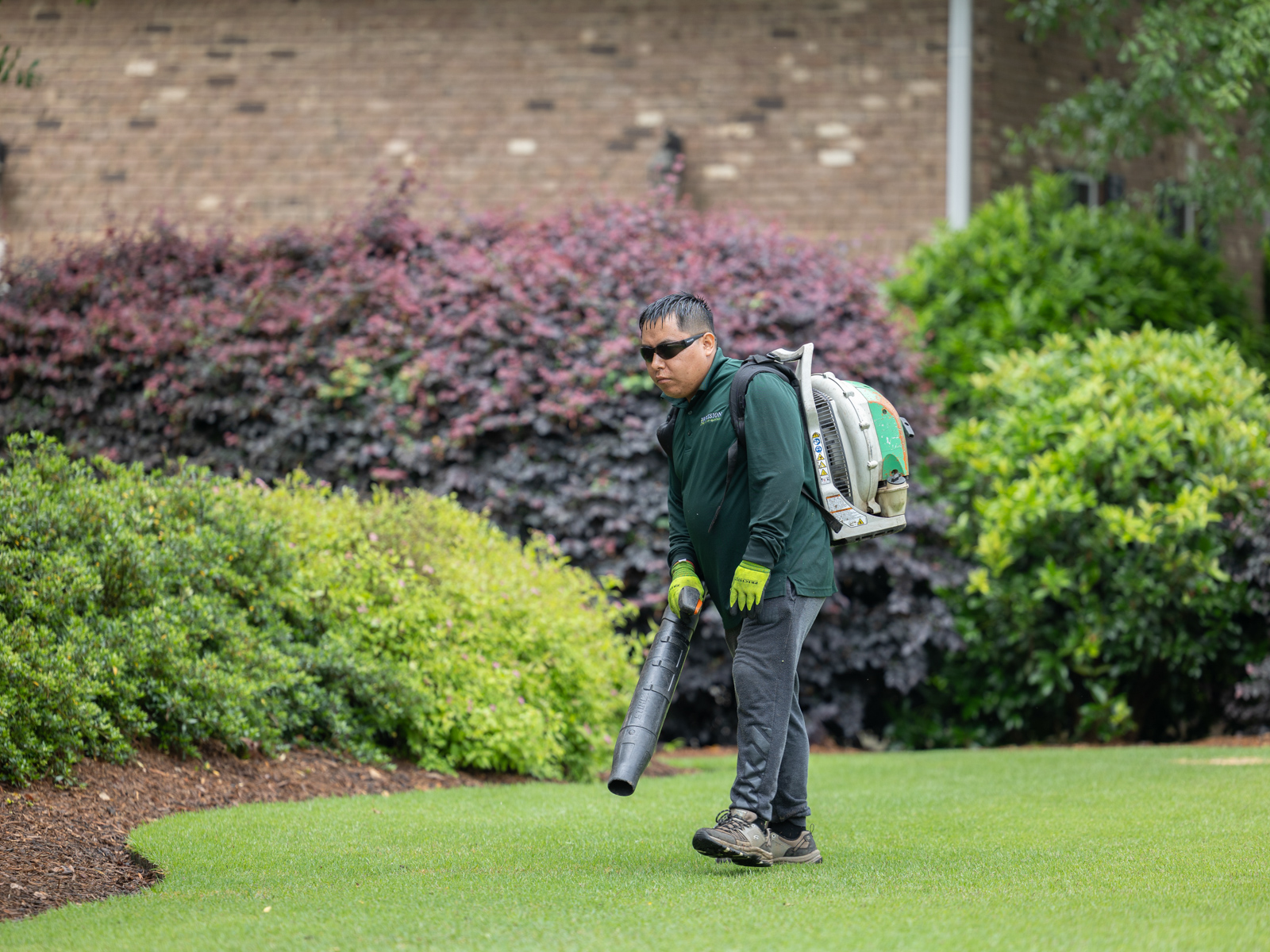 crew maintenance backpack leaf blower grass