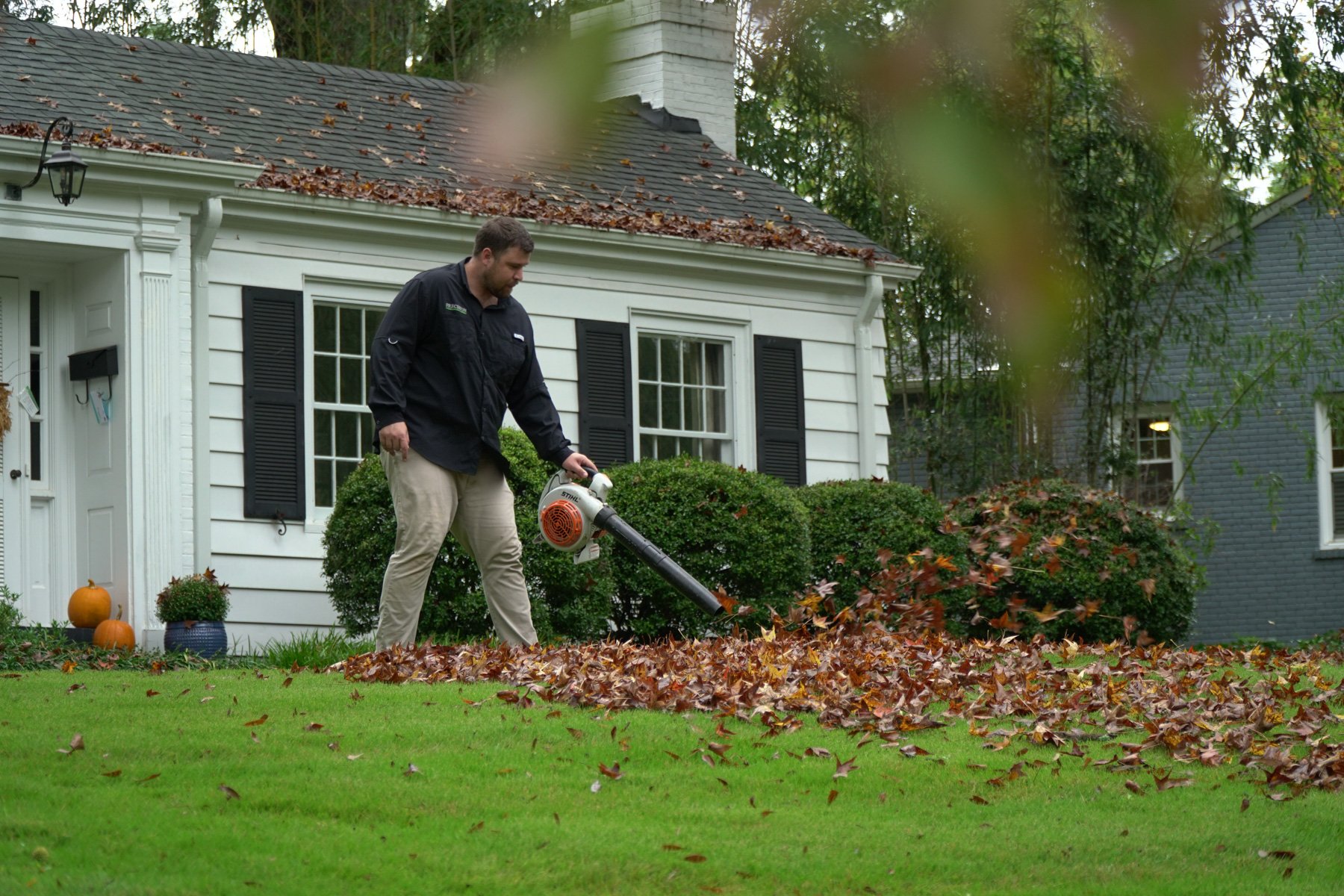 crew maintenance leaf blowing yard cleanup grass fall