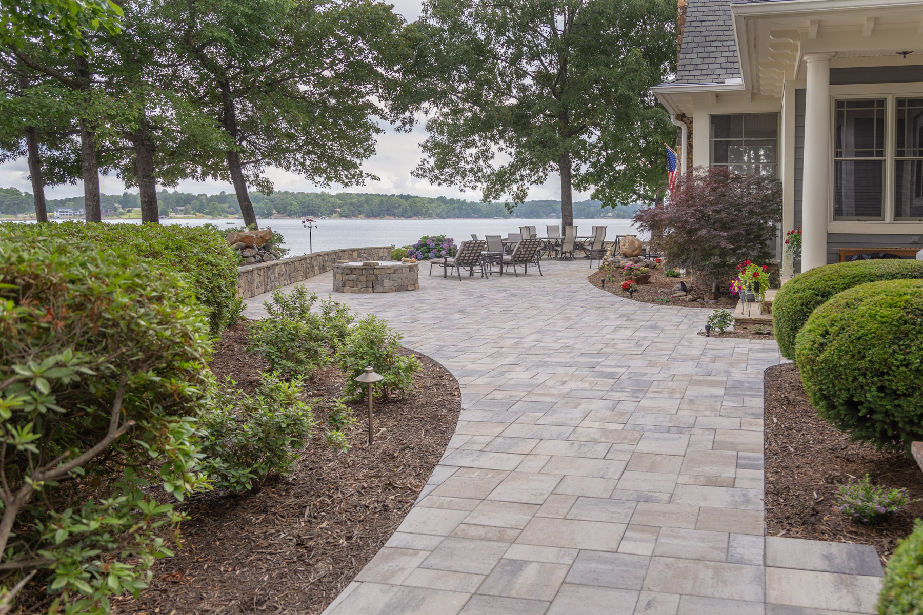 dimensional paver patio mulch bed light lake fire pit seating home stone wall