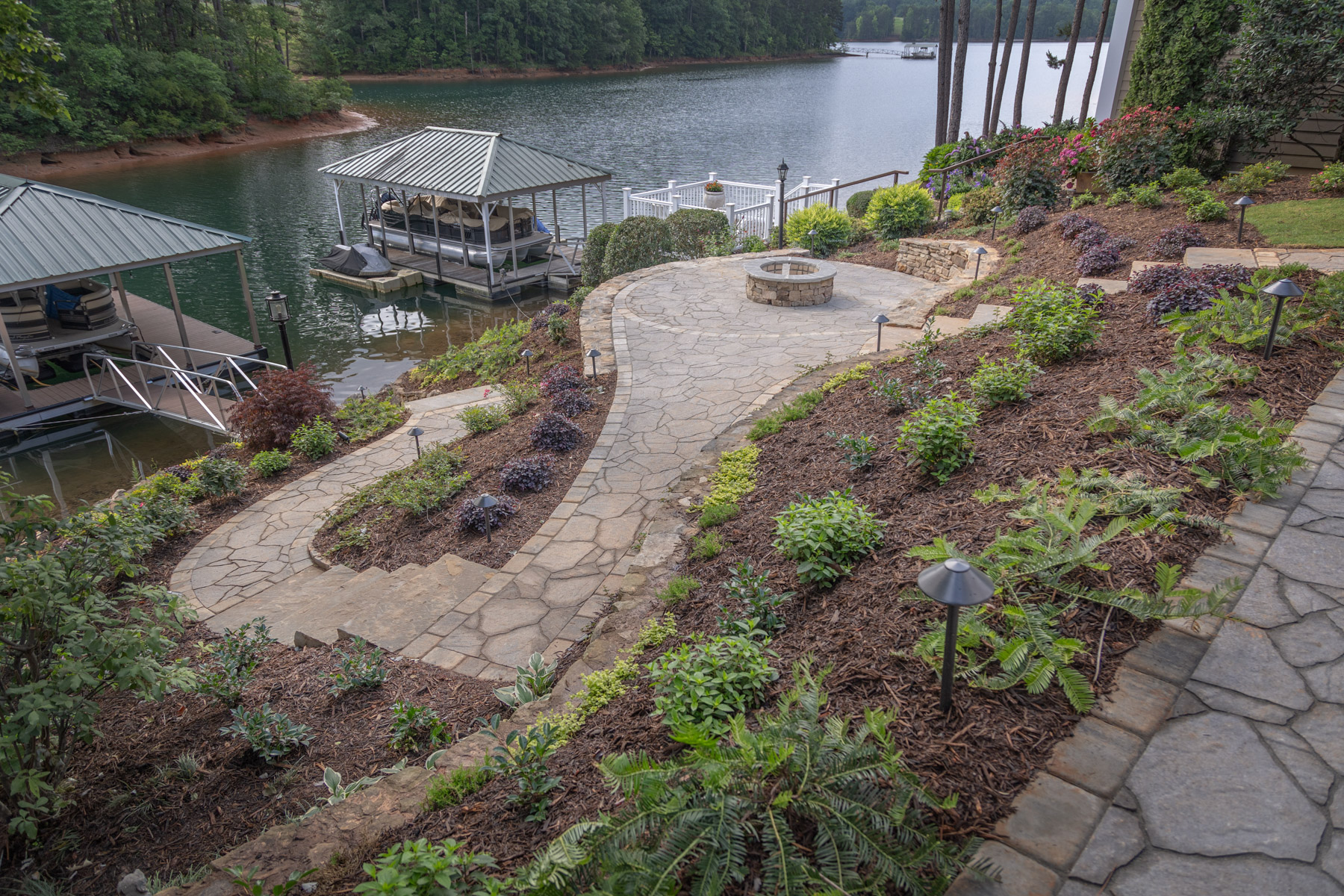 dock pier boat lake stone path steps wall dry stack plants mulch bed fire pit 2