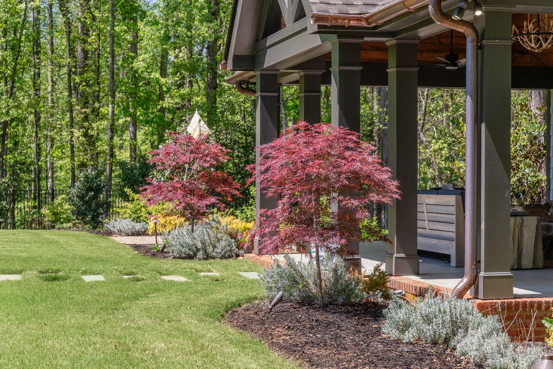 planting bed japanese maple lawn steppers grass trees mulch pergola
