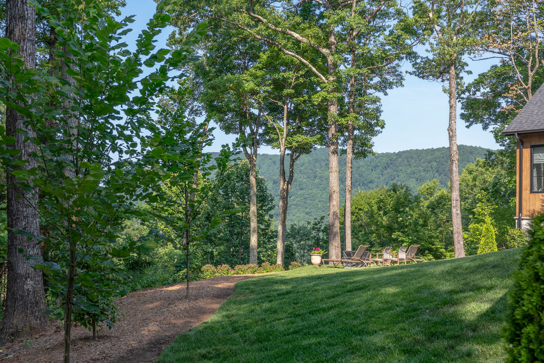 seating grass hills mountains trees after