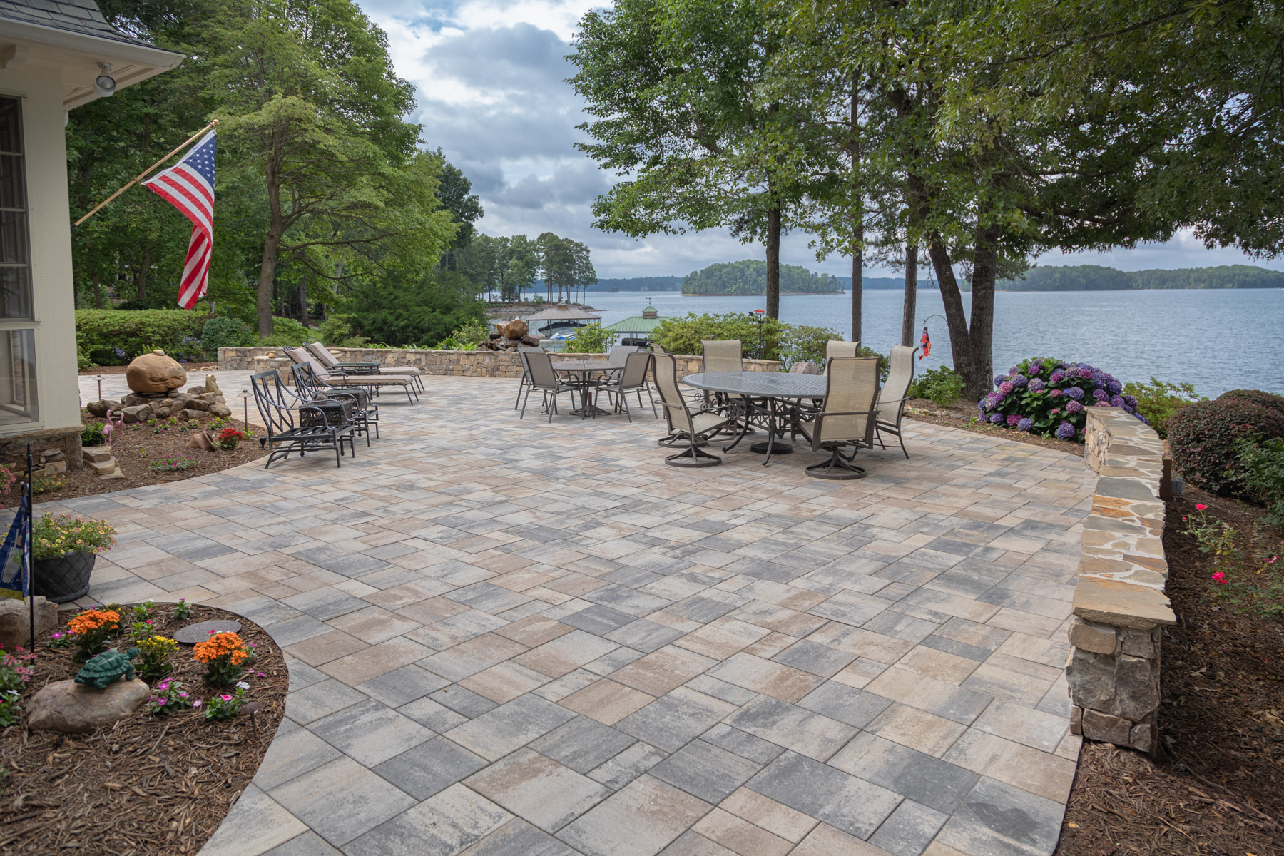seating table dimensional paver patio stone wall lake