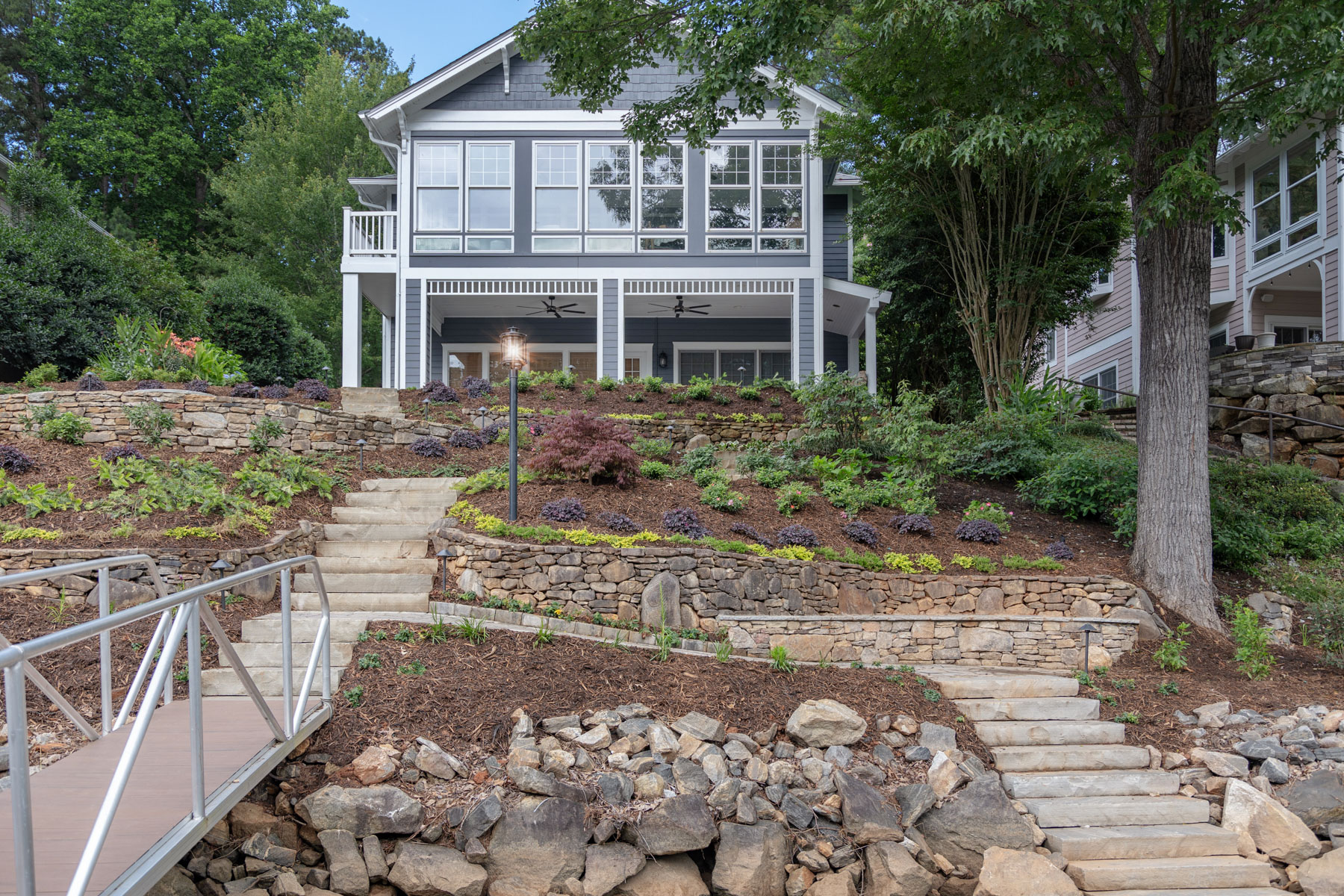 steps stone wall dry stack light home path mulch plants bridge boulders